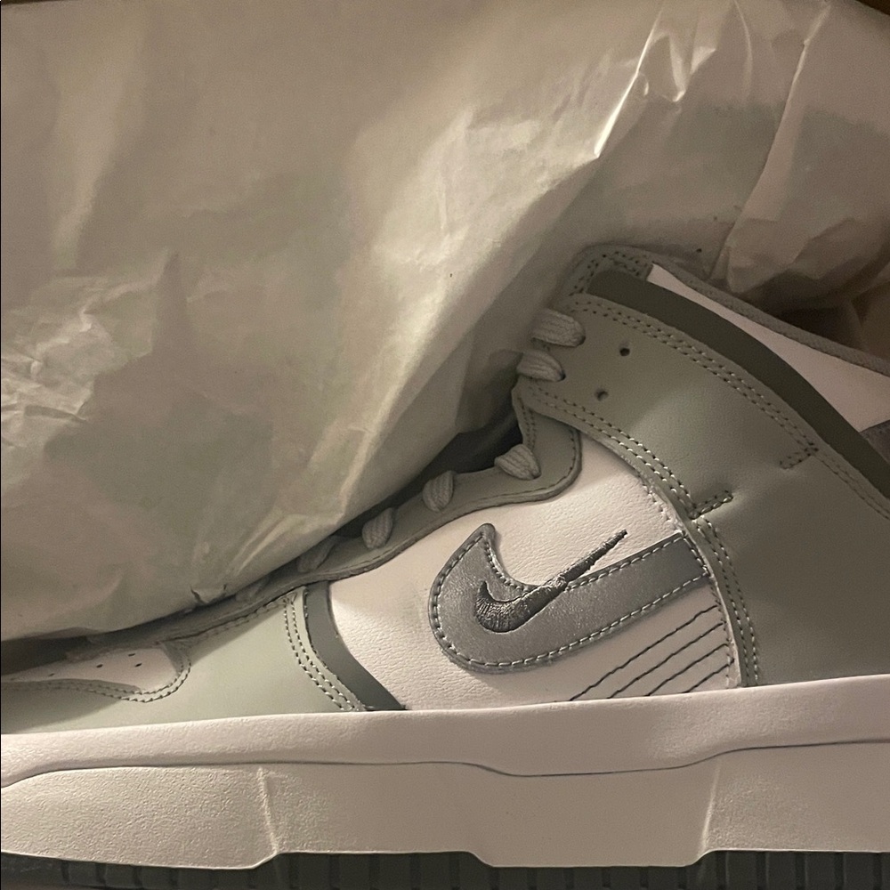 Nike Women’s  Light Gray and White Nike Dunk high Sneakers